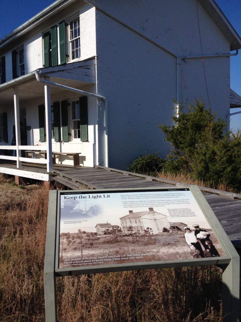 1873 Cape Lookout Light Station Keeper's Quarters with information sign out front