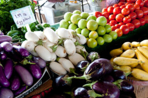 A variety of produce on display at a farmers market